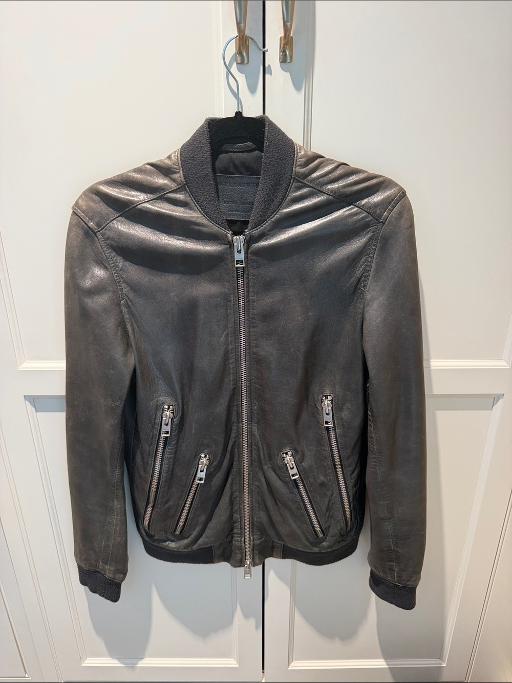 AllSaints Black Leather Bomber Jacket with Zip Pockets